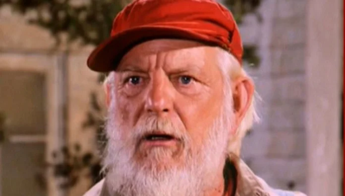denver pyle net worth Vintage photo of actor Denver Pyle smiling on set, symbolizing the lasting legacy and financial success behind Denver Pyle net worth.