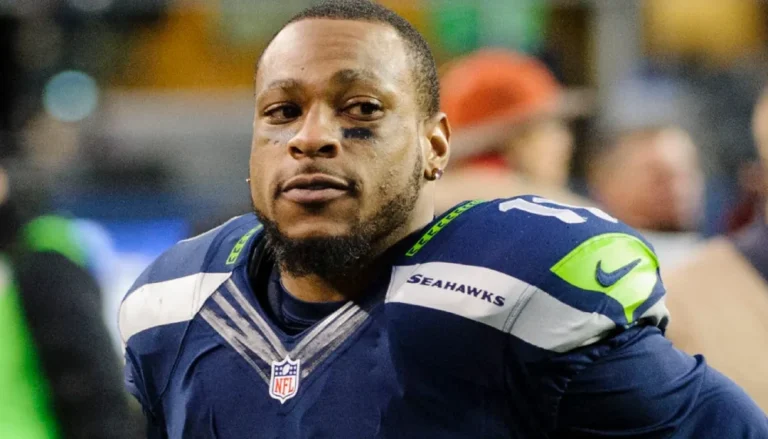 Percy Harvin celebrating during an NFL game, symbolizing the peak of his career and reflecting the journey behind percy harvin net worth.