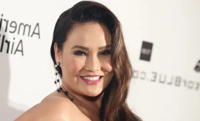 Tia Carrere Net Worth Tia Carrere posing at a red carpet event, symbolizing her Hollywood success and lifestyle—perfectly reflecting the topic tia carrere net worth.